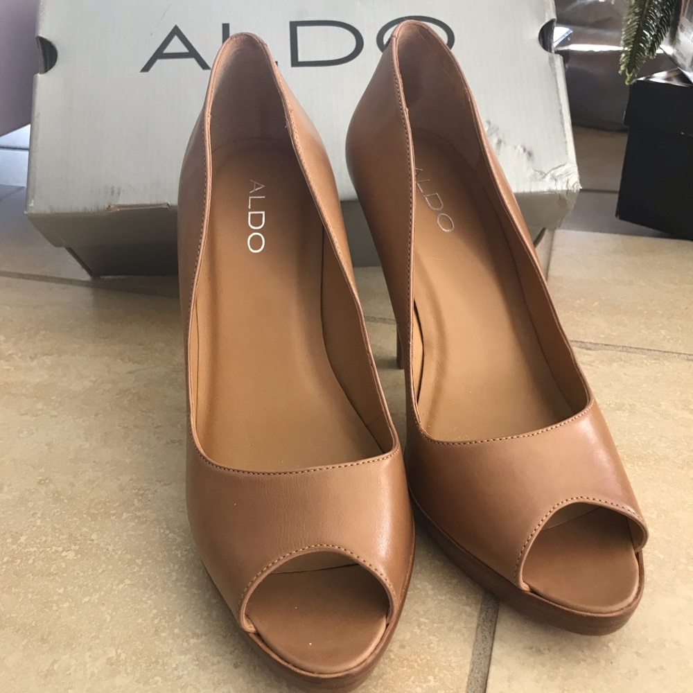 Peep toe high heel shoes